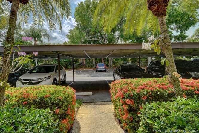 1950 Southwest Palm City Road, Unit 3209 Stuart, FL 34994 - Photo 32 of 64 Lush grounds.