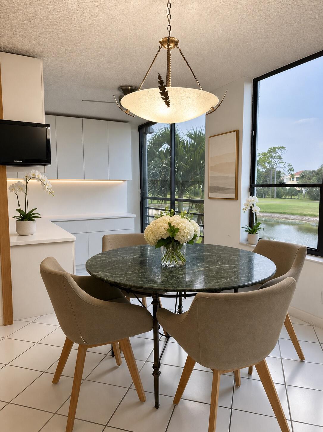 7567 Imperial Drive, Unit 202 Boca Raton, FL 33433 - Photo 9 of 24 dining table