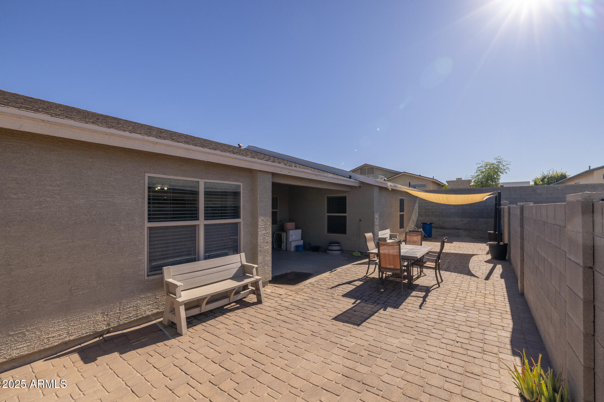129 West Ian Drive Phoenix, AZ 85041 - Photo 16 of 21 a view of a roof deck with table and chairs