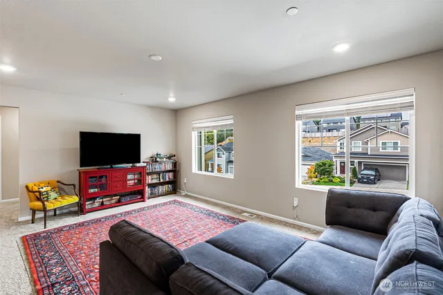 a bedroom with a bed and a desk