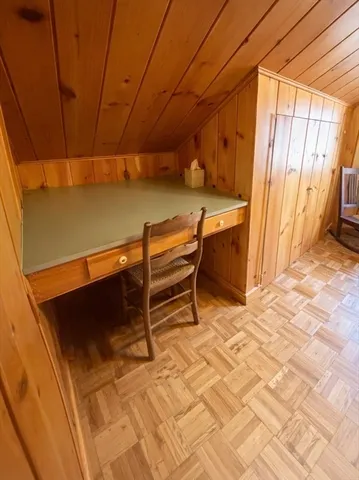 a view of a yard with a large tree