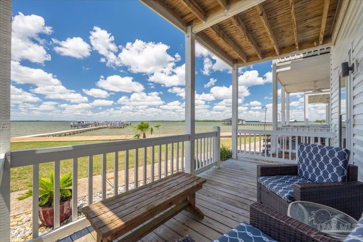 26063 Canal Road, Unit 3F Orange Beach, AL 36561 - Photo 14 of 72 a view of a chairs in balcony