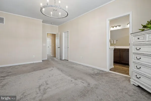an empty room with fan