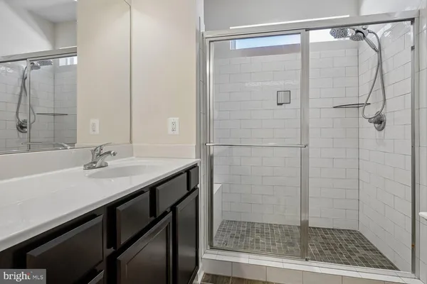 an empty room with a bathroom