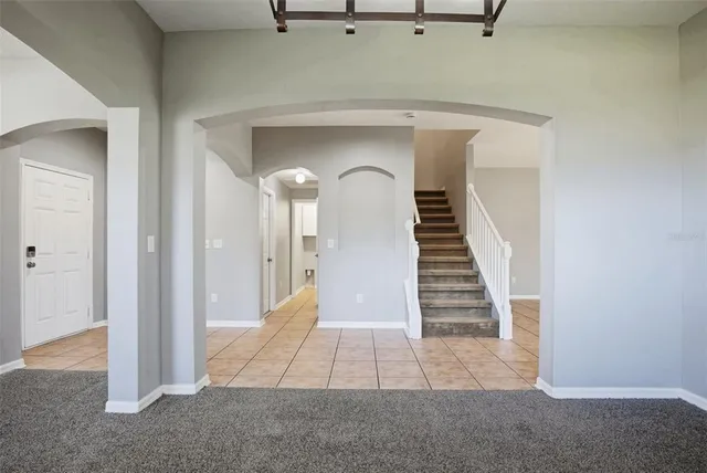 a view of a hallway with entryway