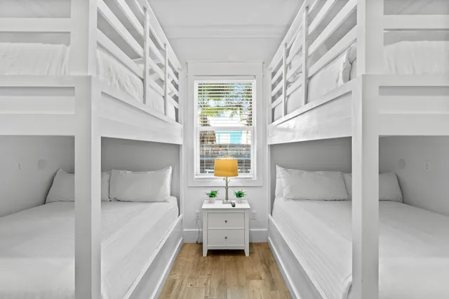 a large living room with furniture and a large window