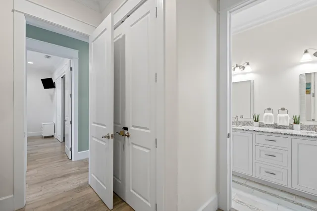 a kitchen with granite countertop a sink and a stove