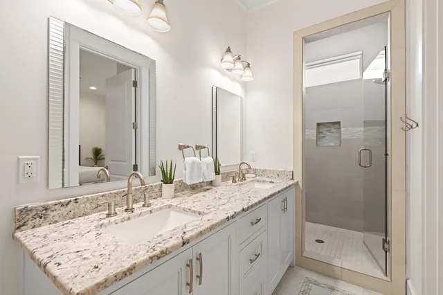 a kitchen with a stove a sink and a microwave