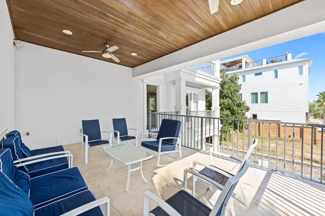 a bedroom with a large bed and a flat screen tv