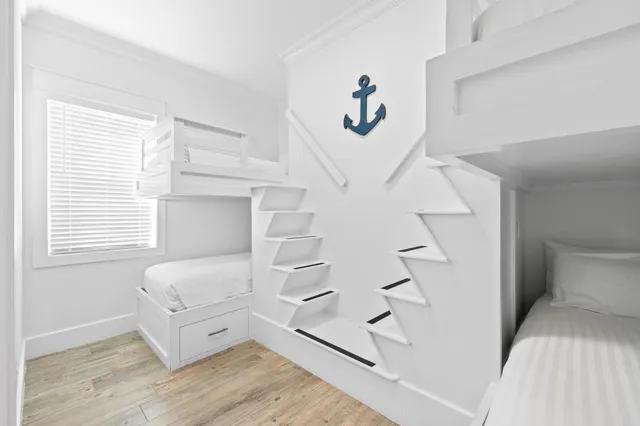 a view of a terrace with a table and chairs