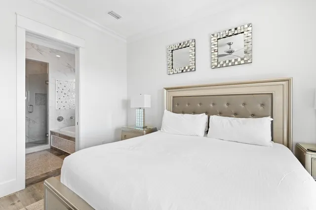 a view of a patio with a table and chairs