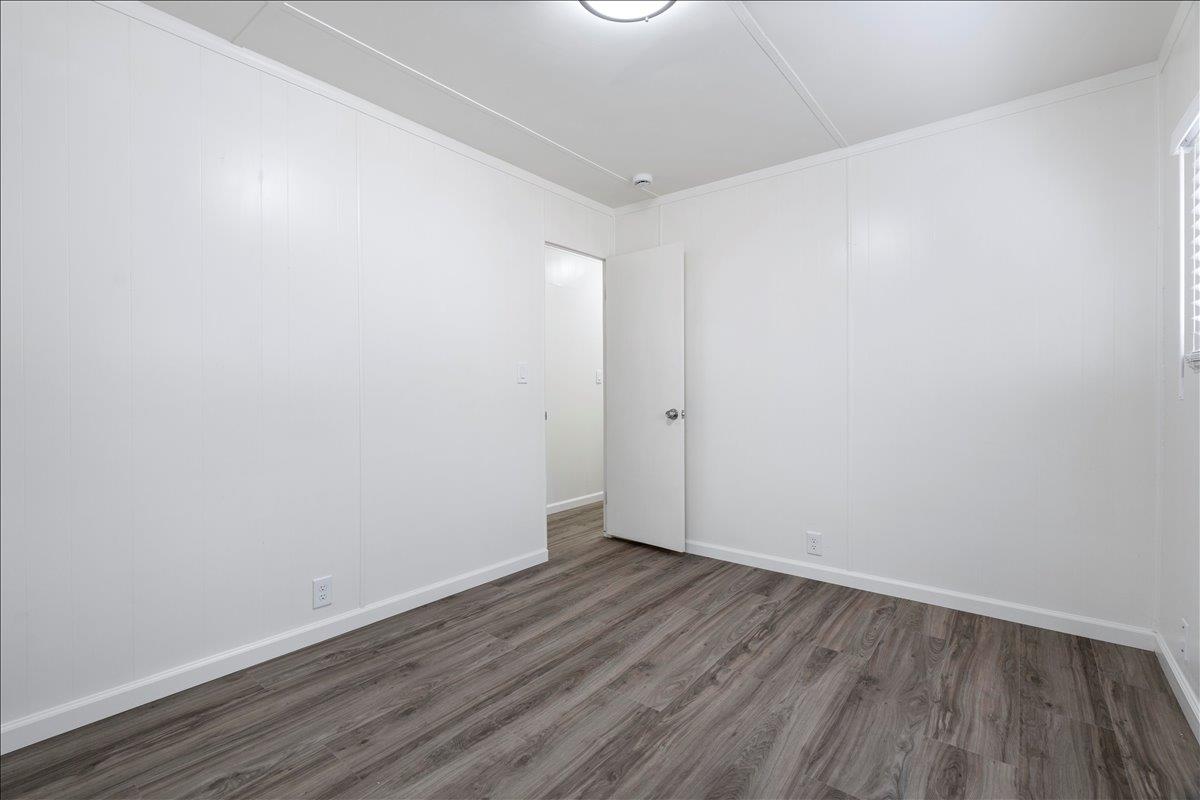 1525 Cold Springs Road, Unit 37 Placerville, CA 95667 - Photo 15 of 37 a view of an empty room with wooden floor