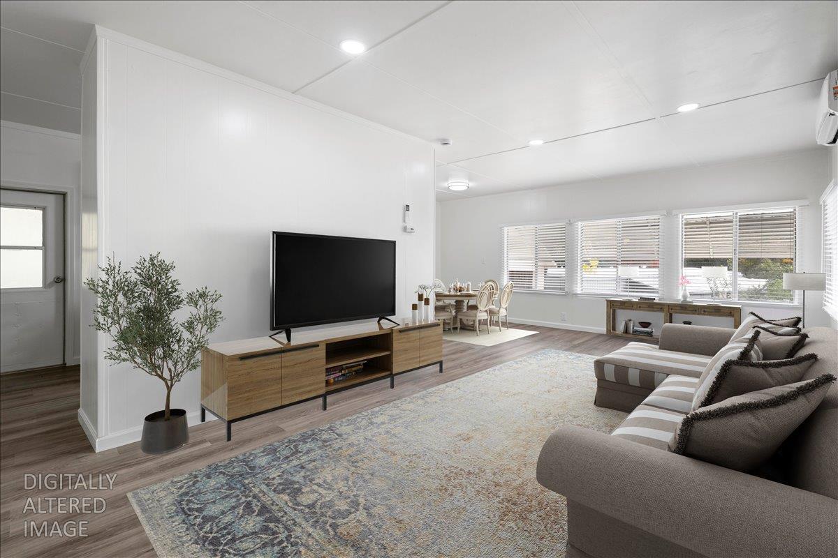 1525 Cold Springs Road, Unit 37 Placerville, CA 95667 - Photo 6 of 37 a living room with furniture and a flat screen tv