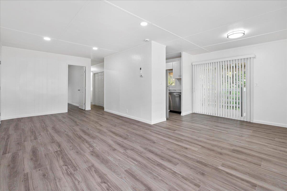1525 Cold Springs Road, Unit 37 Placerville, CA 95667 - Photo 8 of 37 an empty room with wooden floor and windows