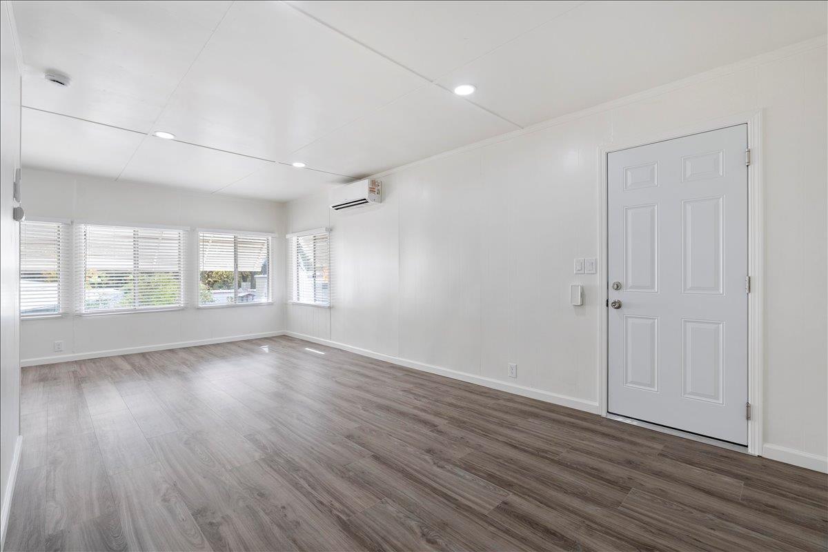 1525 Cold Springs Road, Unit 37 Placerville, CA 95667 - Photo 10 of 37 an empty room with wooden floor and windows