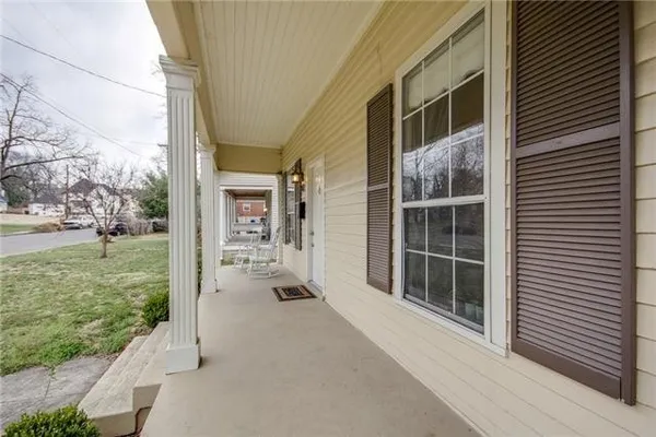 a view of front door and yard