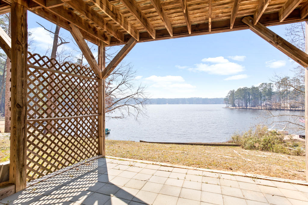 125 New Stillwell Road Springfield, GA 31329 - Photo 32 of 46 Lower patio view of Thagards Lake