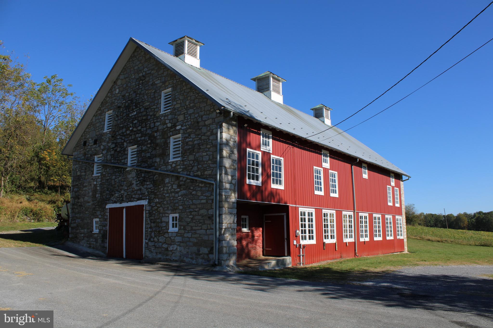 1451 West Leesport Road Leesport, PA 19533 - Photo 2 of 11 a front view of a house with a yard