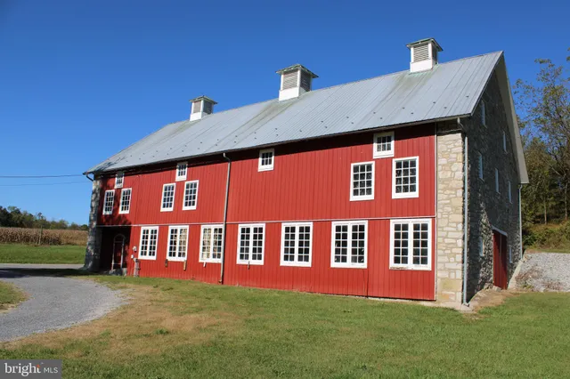 a front view of building with yard