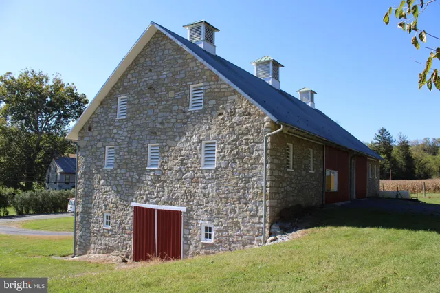 a brick house with a yard