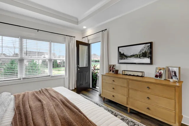 a bed room with a bed and a couch