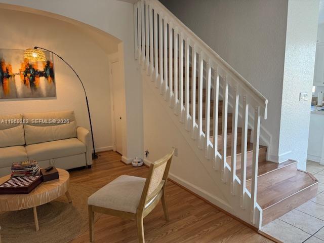 15243 Southwest 9th Way Miami, FL 33194 - Photo 3 of 14 a view of a livingroom with furniture and staircase
