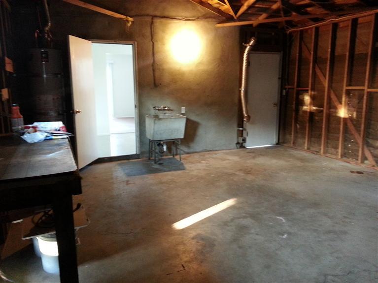 618 Manning Avenue Reedley, CA 93654 - Photo 22 of 24 Washer/Dryer Hook Ups in Garage with Utility Sink and Work Bench