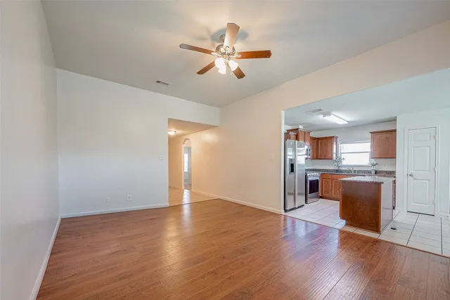a view of a livingroom with a kitchen