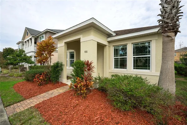 front view of a house with a yard