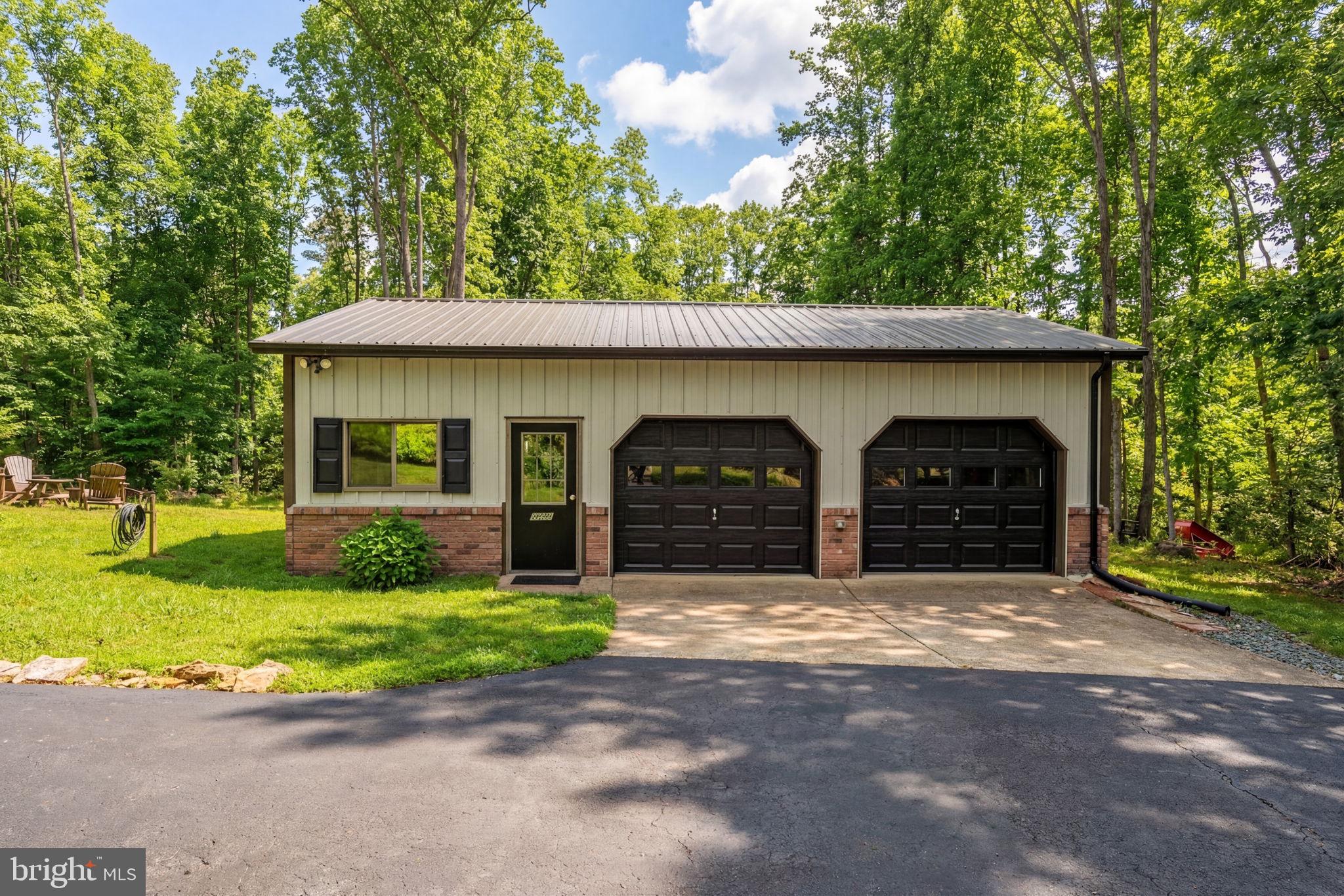 2266 Beaver Dam Road Midland, VA 22728 - Photo 10 of 91 Insulated garage doors.