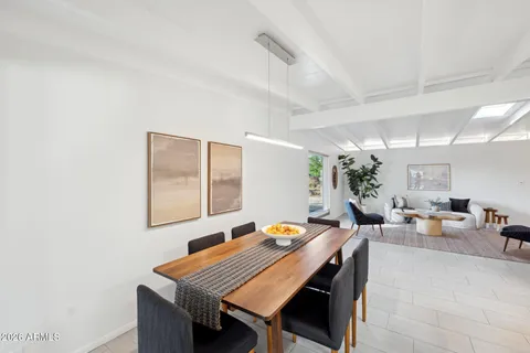 a kitchen with a refrigerator and countertop