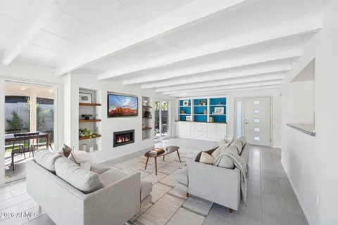 a living room with furniture and a couch