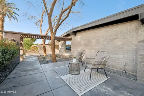 a backyard of a house with plants