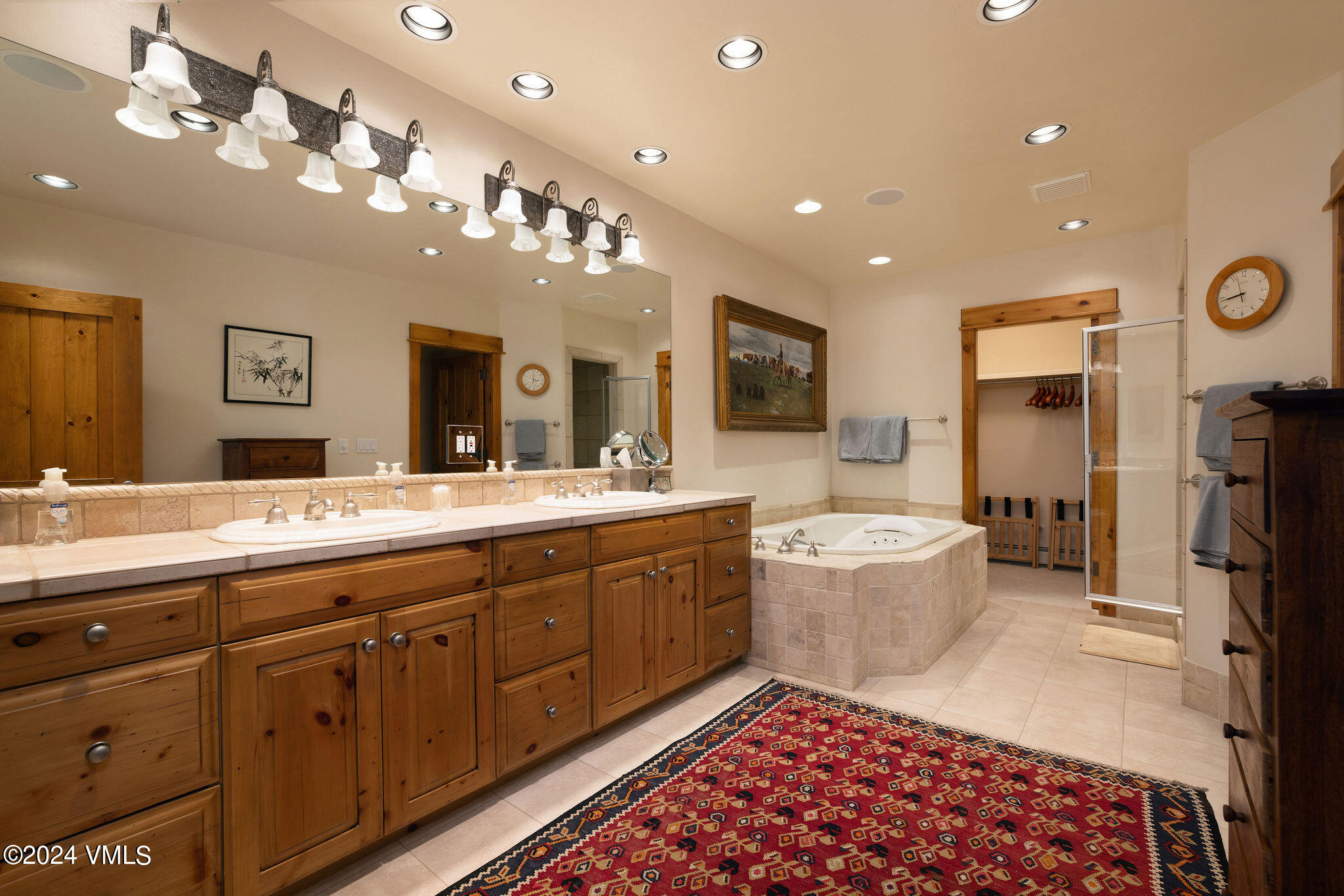 162 River Dance Road Edwards, CO 81632 - Photo 17 of 23 a spacious bathroom with a double vanity sink mirror and bathtub