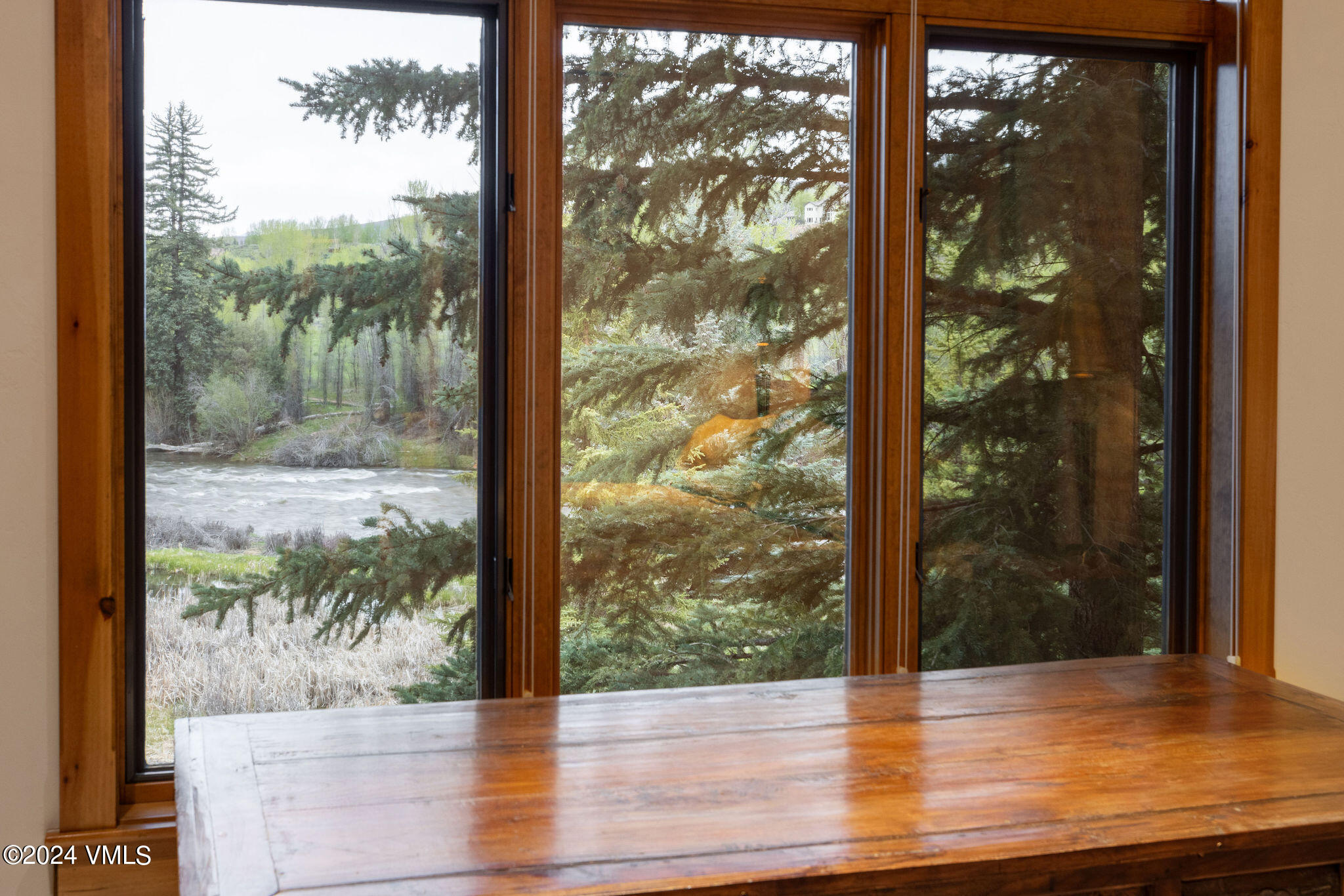 162 River Dance Road Edwards, CO 81632 - Photo 19 of 23 a view of a glass door with wooden floor