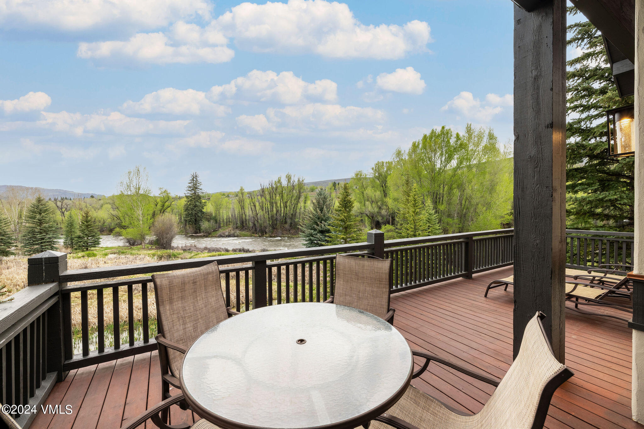 162 River Dance Road Edwards, CO 81632 - Photo 5 of 23 a view of a balcony with wooden floor and city view