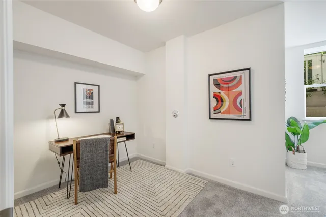 a workspace with furniture and desk