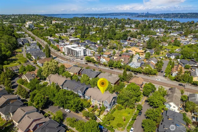 an aerial view of residential house with outdoor space and swimming pool