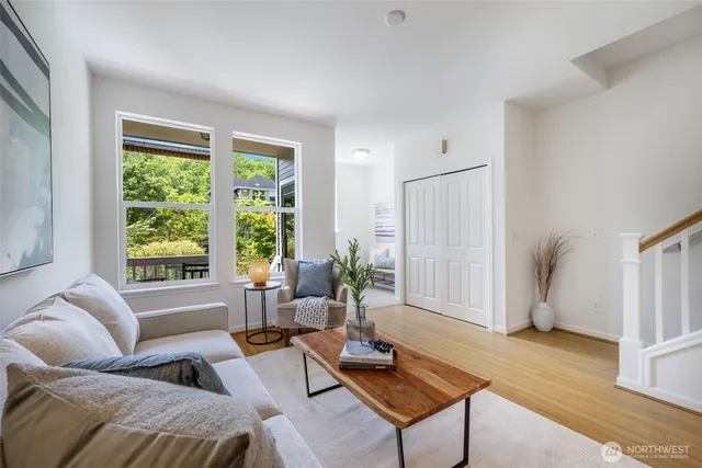 a living room with furniture and a window