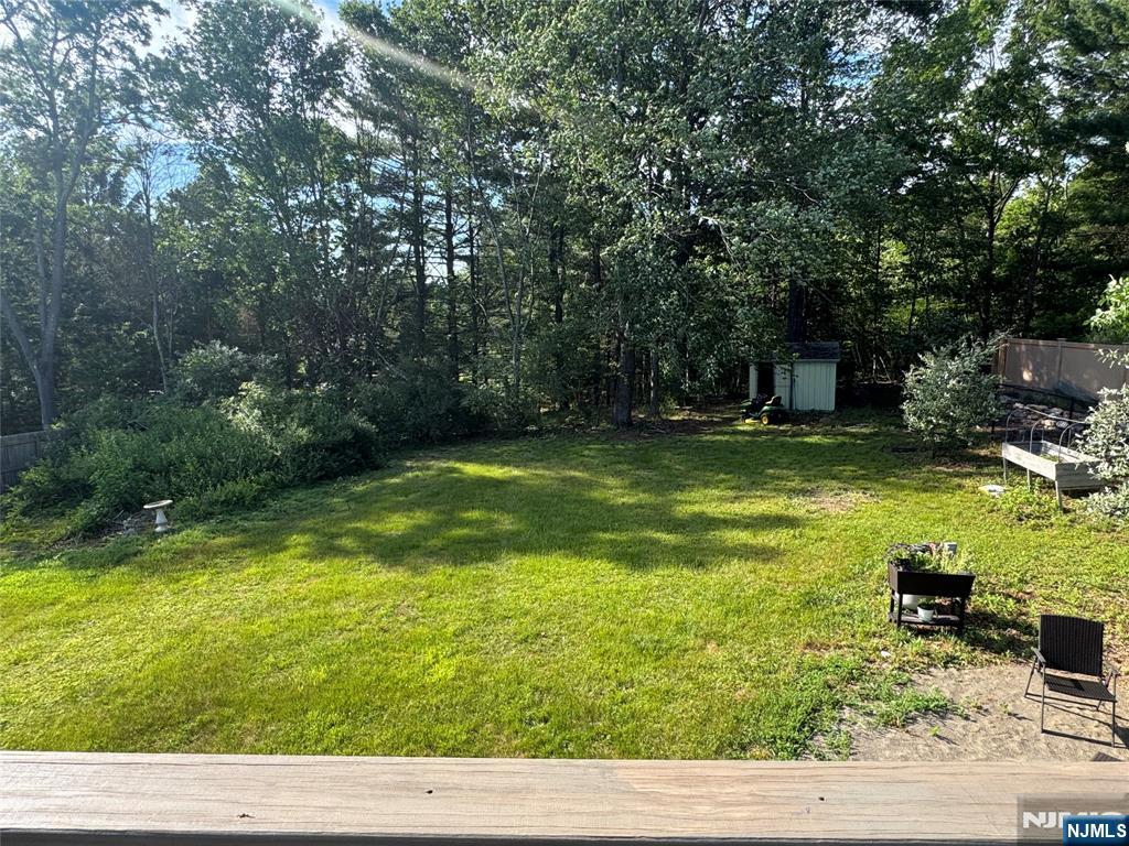 55 Maryann Road Oak Ridge, NJ 07438 - Photo 20 of 20 a view of swimming pool from a yard