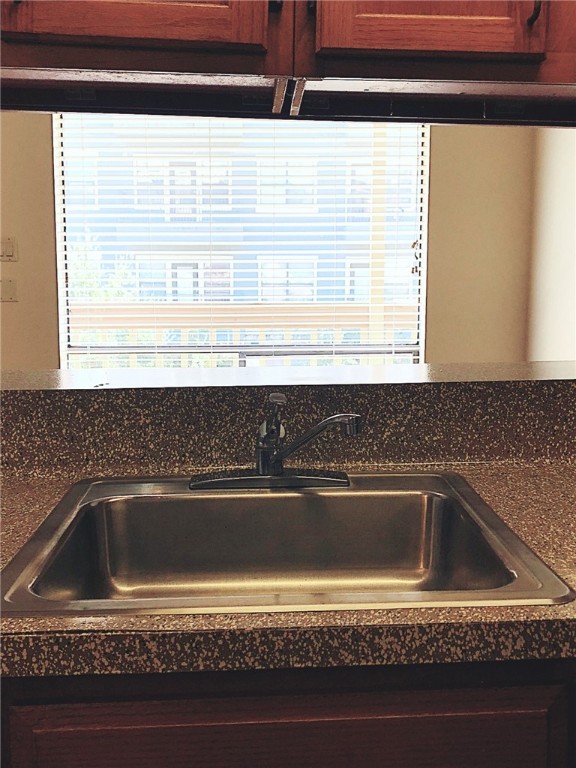 2210 Pearl Street, Unit 304 Austin, TX 78705 - Photo 17 of 32 a close view of sink and tap