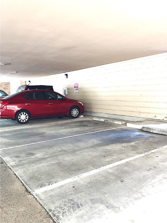 2210 Pearl Street, Unit 304 Austin, TX 78705 - Photo 32 of 32 a car parked on the side of the road