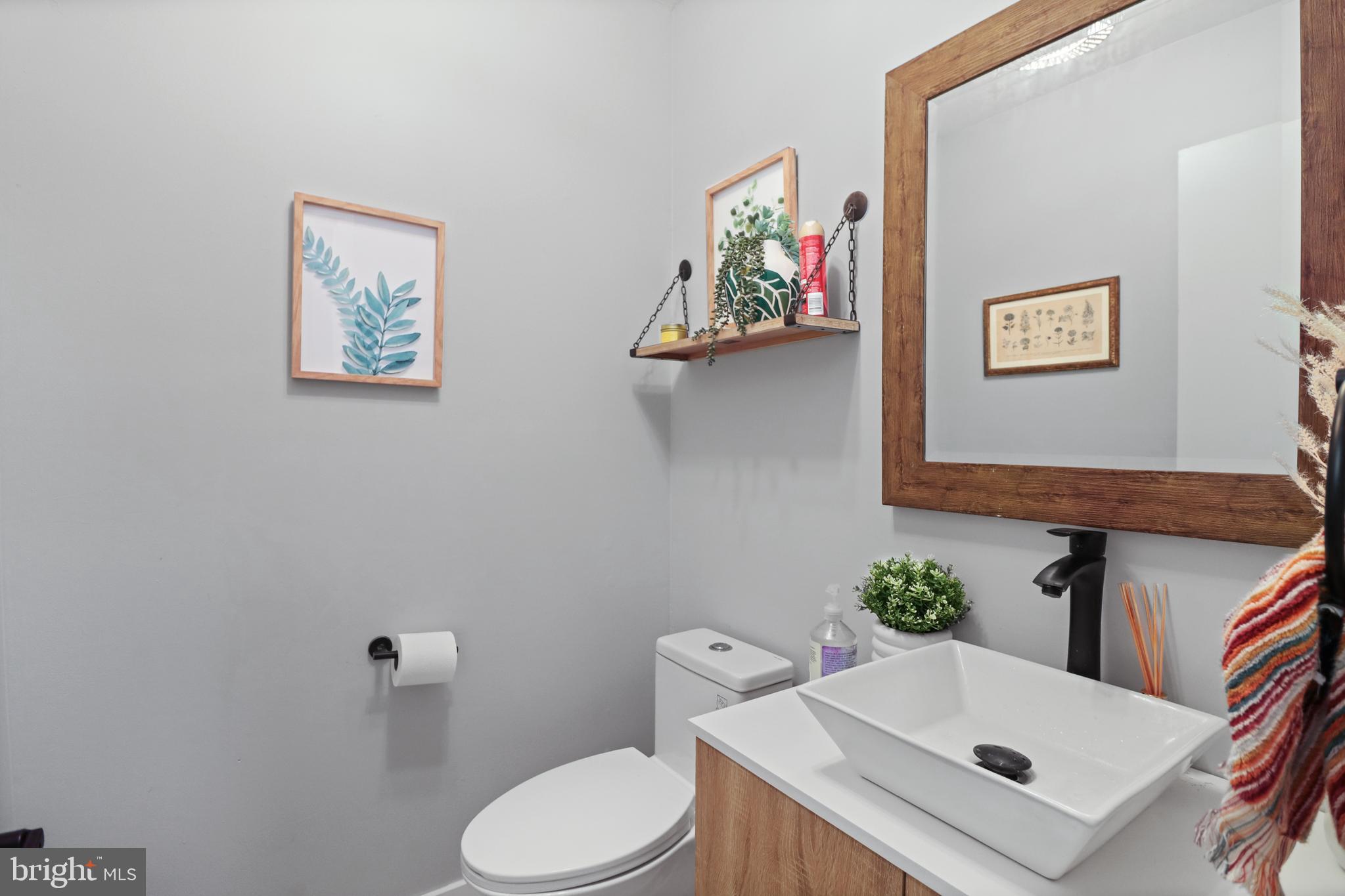 8 Bayleaf Drive Lumberton, NJ 08048 - Photo 30 of 53 a white toilet sitting next to a bathroom sink