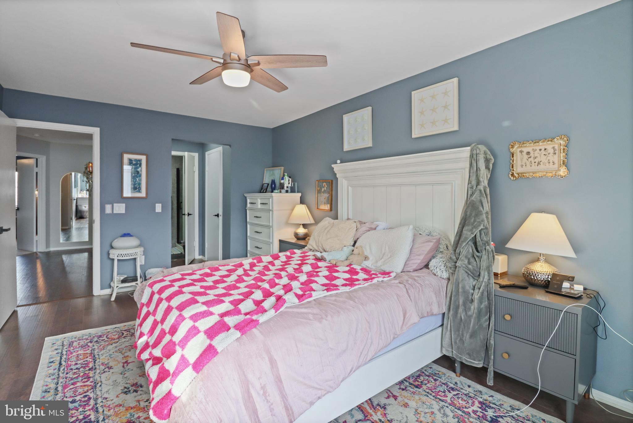 8 Bayleaf Drive Lumberton, NJ 08048 - Photo 32 of 53 a bedroom with a bed and a chandelier
