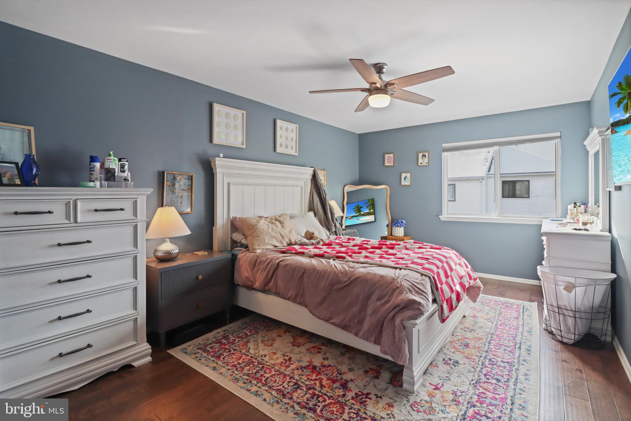 8 Bayleaf Drive Lumberton, NJ 08048 - Photo 33 of 53 a bedroom with a bed and a chandelier