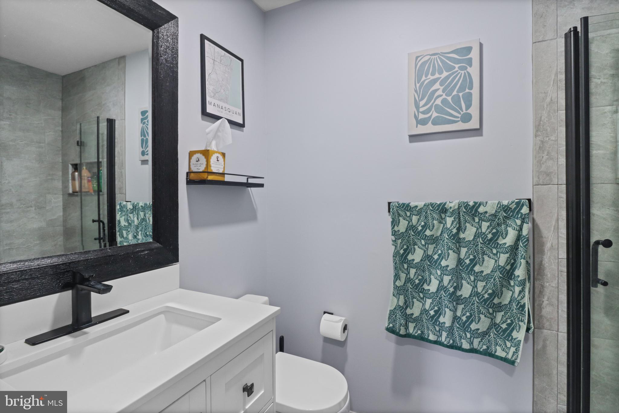 8 Bayleaf Drive Lumberton, NJ 08048 - Photo 36 of 53 a bathroom with a toilet sink and mirror