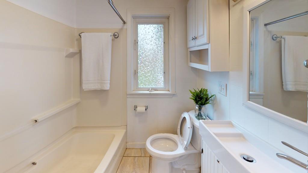 23 Middleboro Road Freetown, MA 02717 - Photo 20 of 30 a bathroom with a sink a toilet and tub