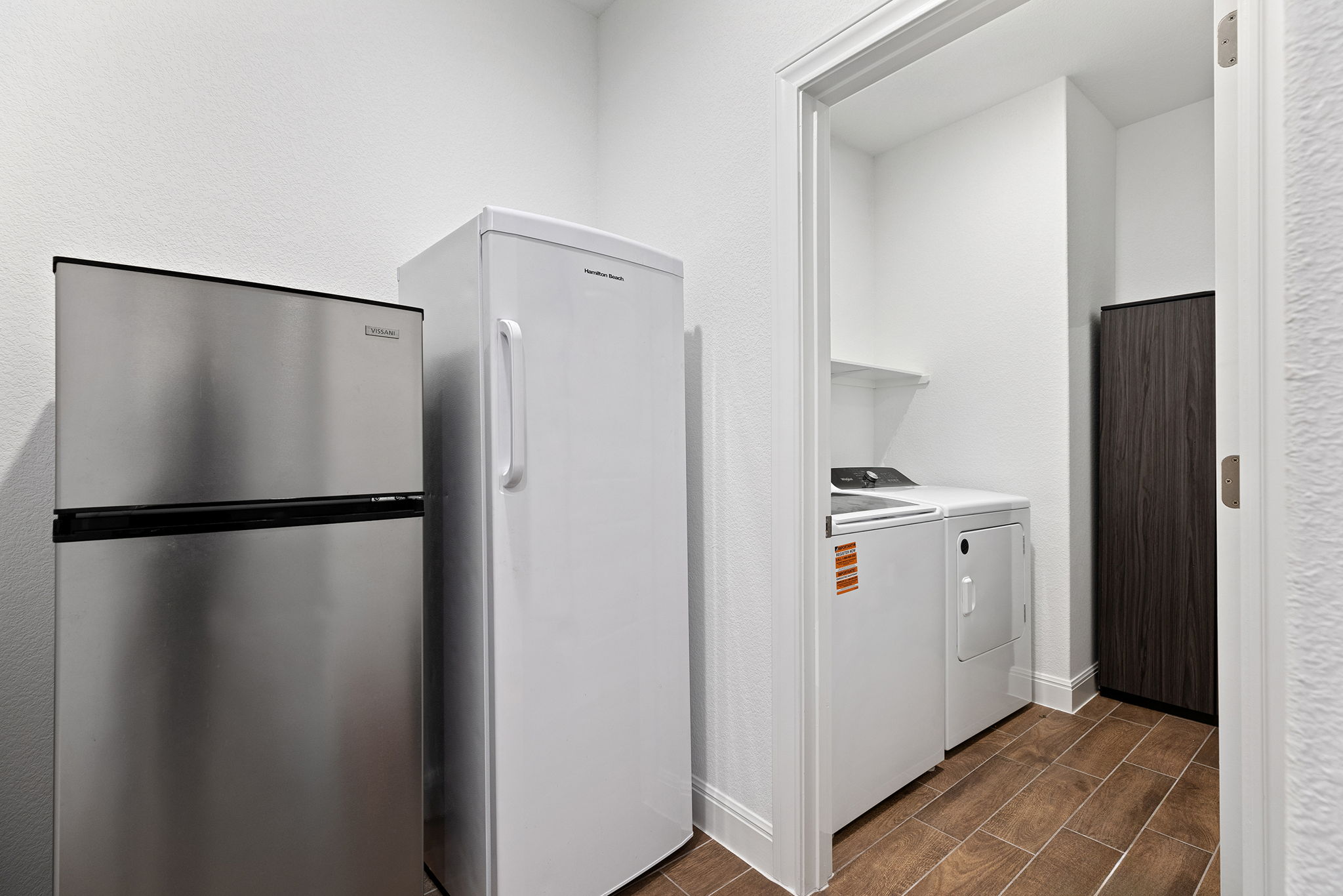 116 Raleigh Drive Georgetown, TX 78633 - Photo 24 of 28 Functional utility space with washer, dryer, and additional refrigeration.