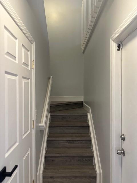 4151 Eastridge Circle Deerfield Beach, FL 33064 - Photo 18 of 53 a view of staircase with railing and white walls