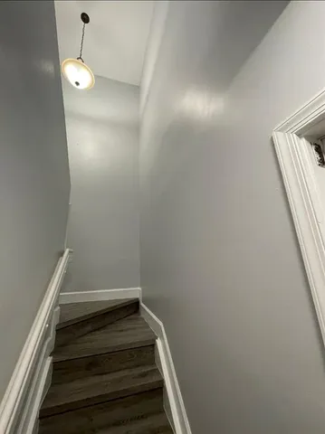 a view of hallway with washer and dryer